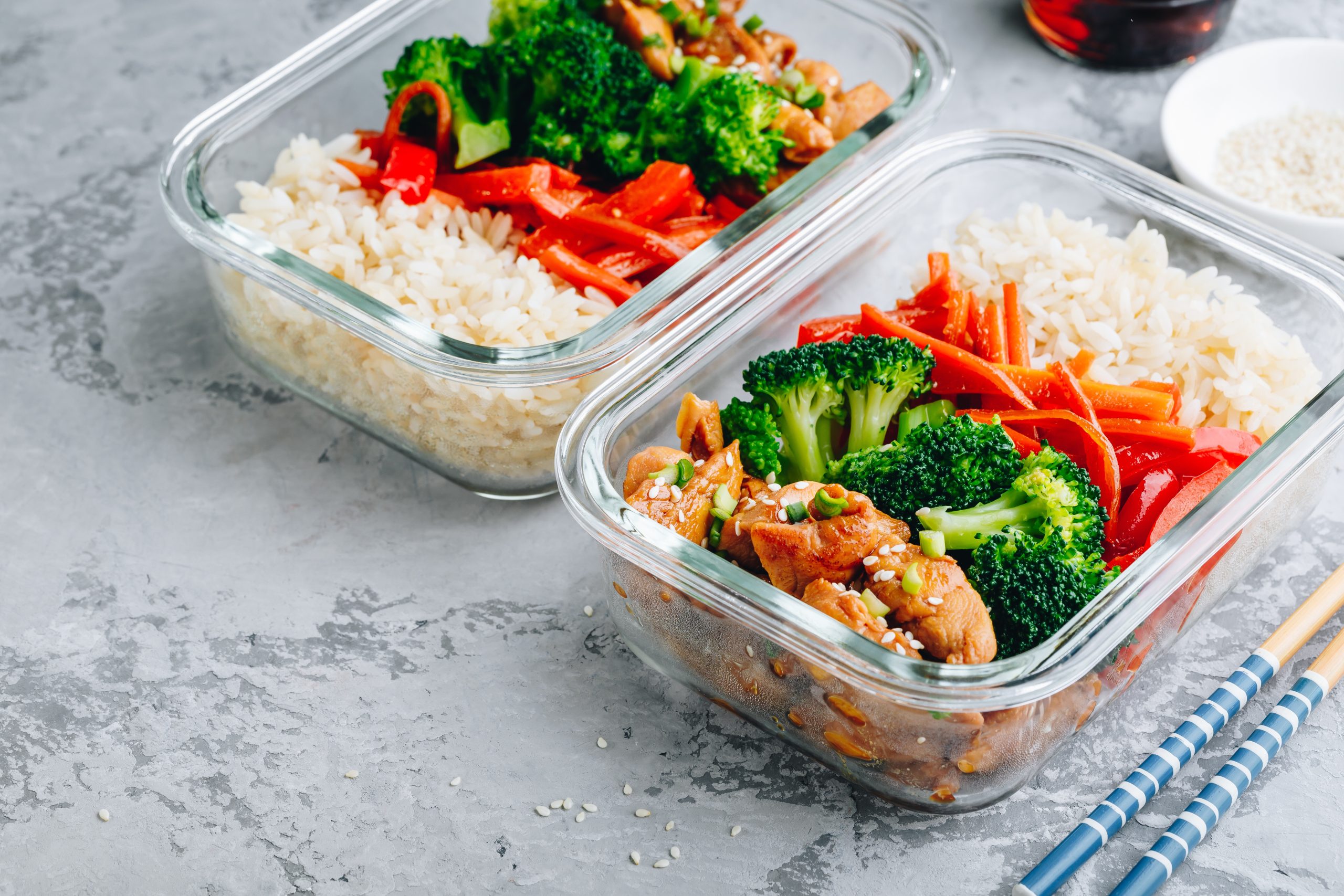 Chicken teriyaki stir fry meal prep lunch box containers with broccoli, rice and carrots | FitMeals4U